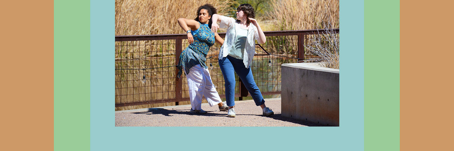 Two people fluidly dancing parallel to each other in front of the riparian brush at the Audubon Center. Photo by Franscisco Lara-Valencia.