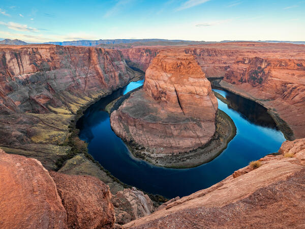 river curves through arizona desert mountains