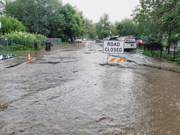 A flooded residential street. US Forest Service
