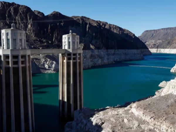 Large dam in a desert canyon.